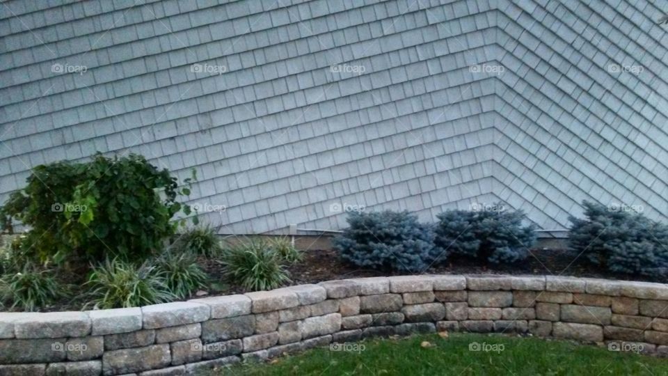 shingled wall and planter wall