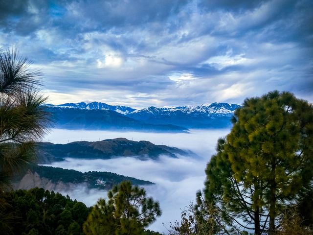 clouds between the mountains and amazing surrounding.
