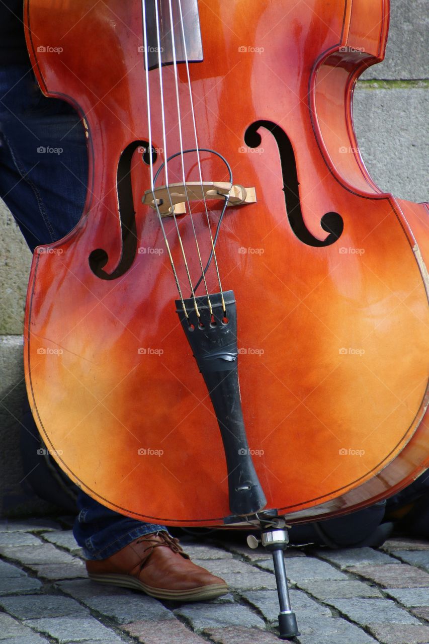 Street musician and a cello