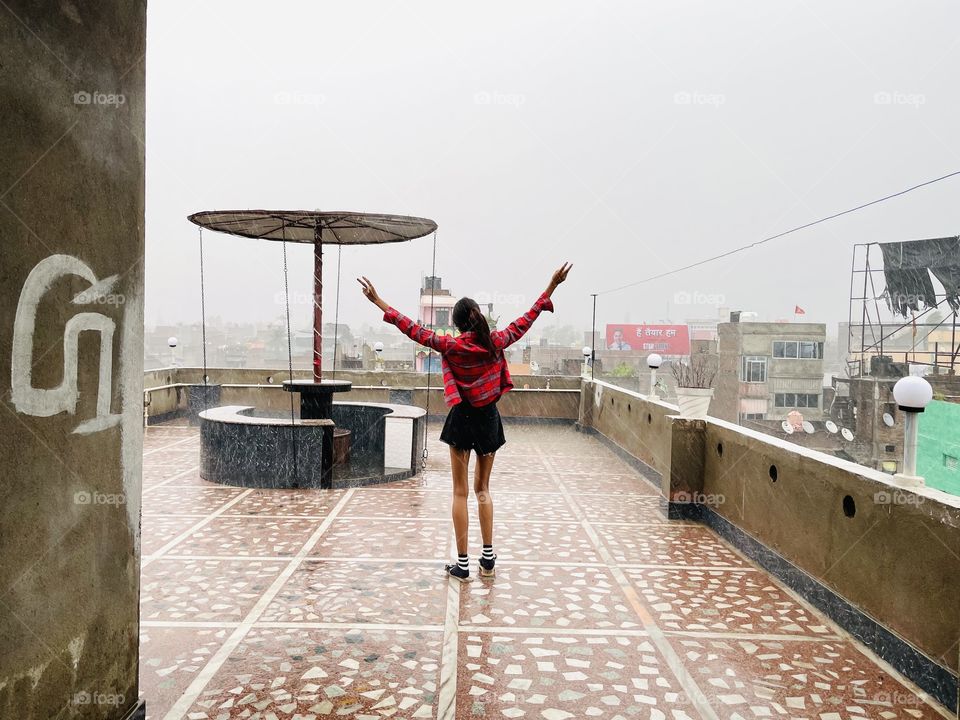 Enjoying and smiling in rain