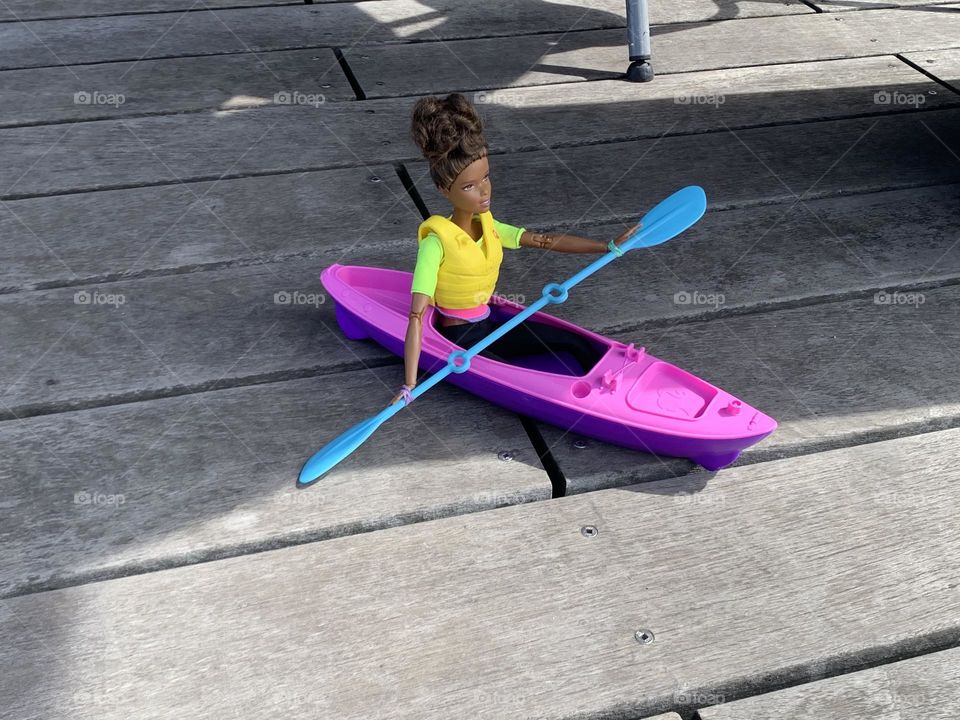 Barbie kayaking 