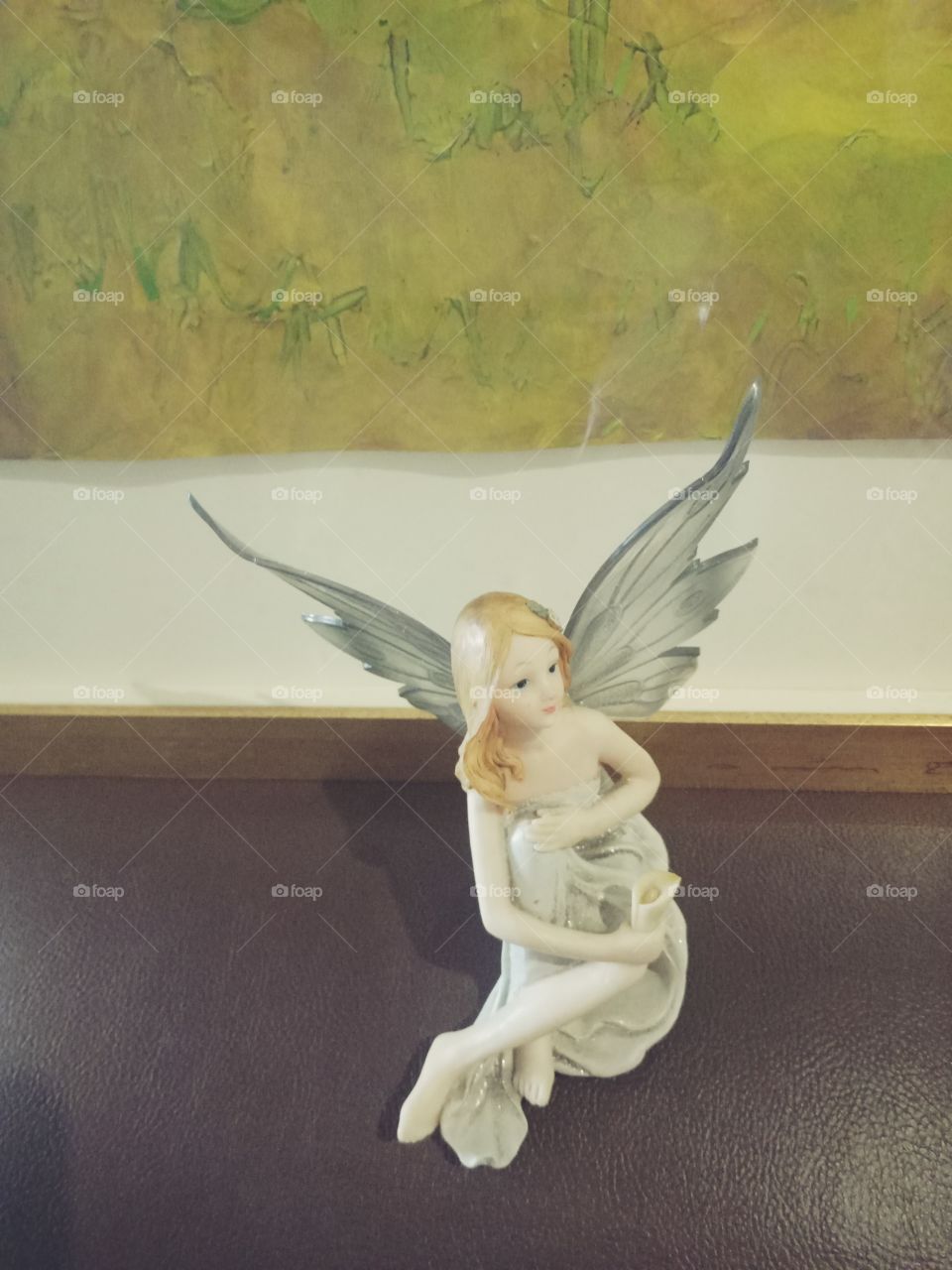 Excellent. 
A sitting beautiful figurine angel gifts.