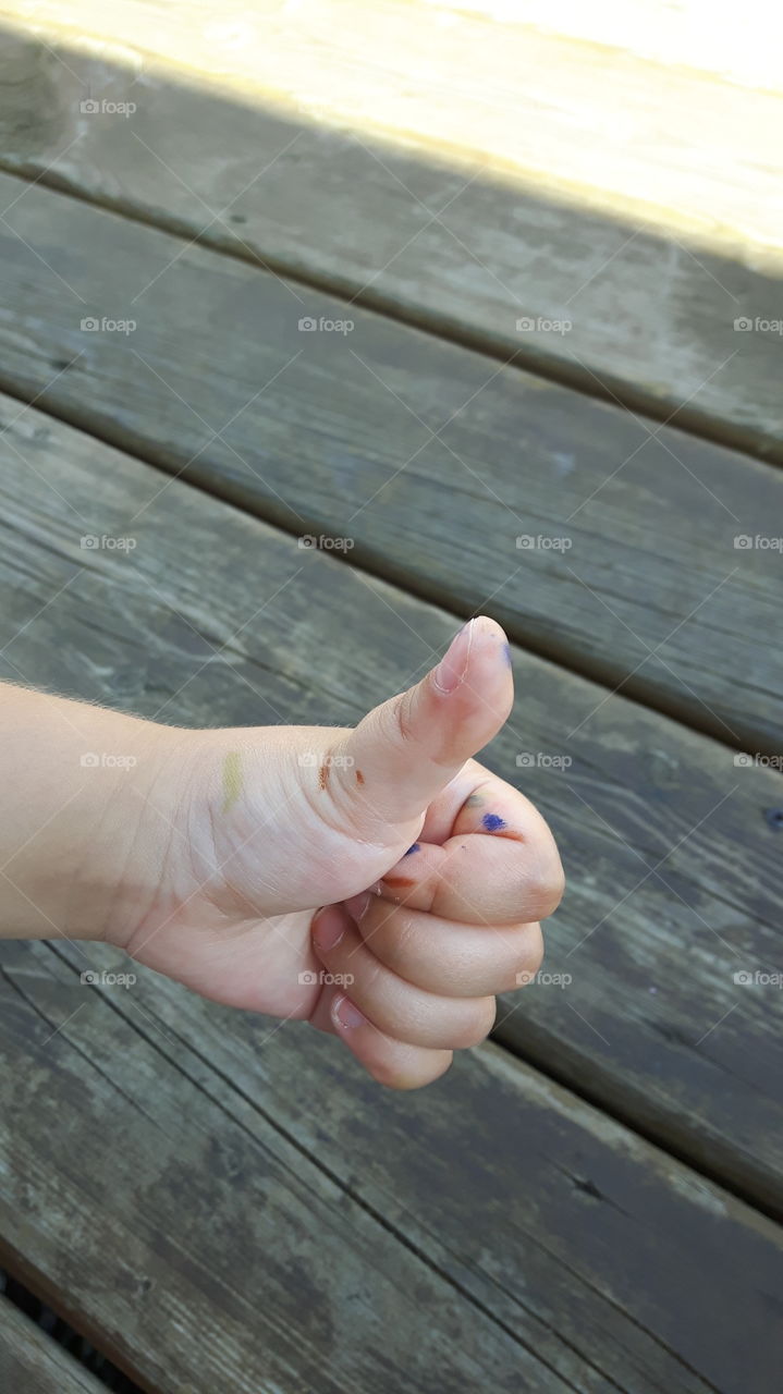 marker covered thumbs up