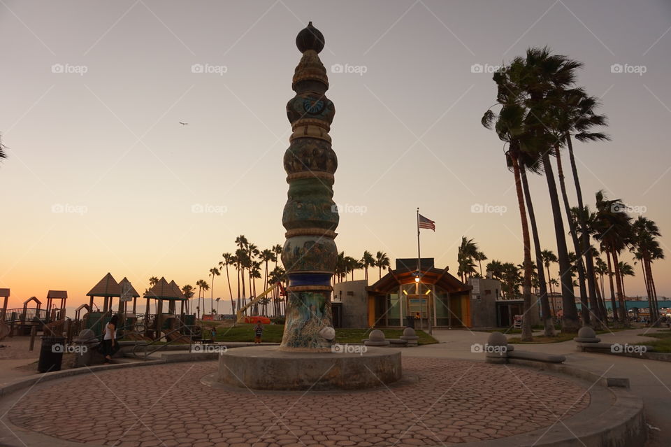 venice beach monument at sunset