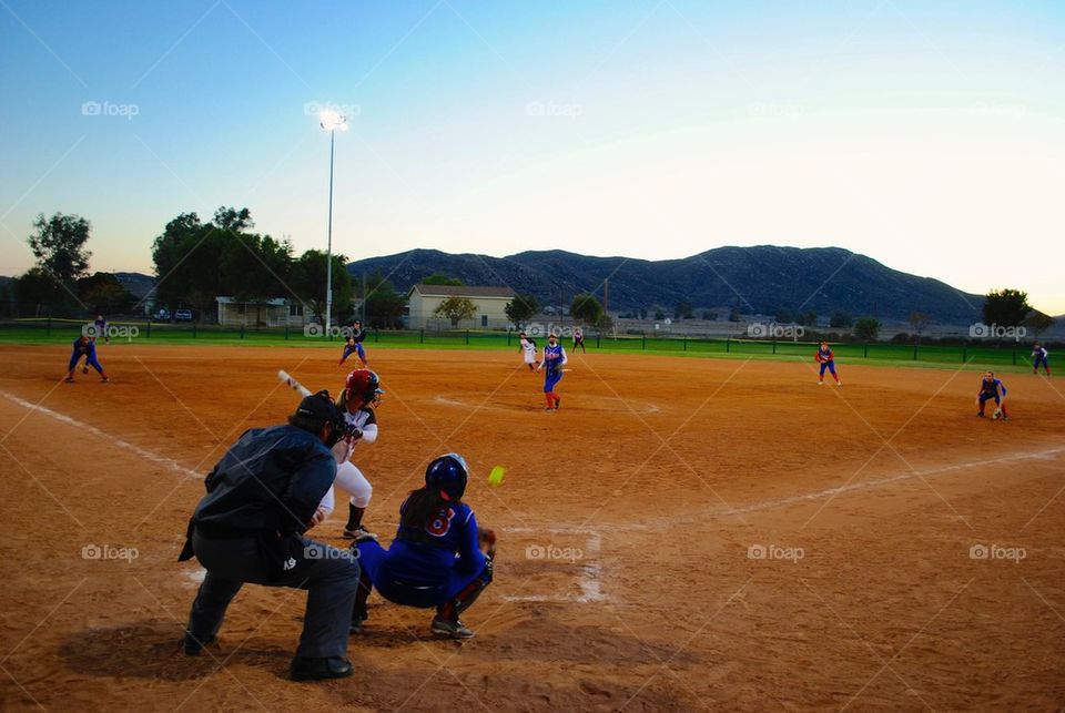 Softball pitch summer night