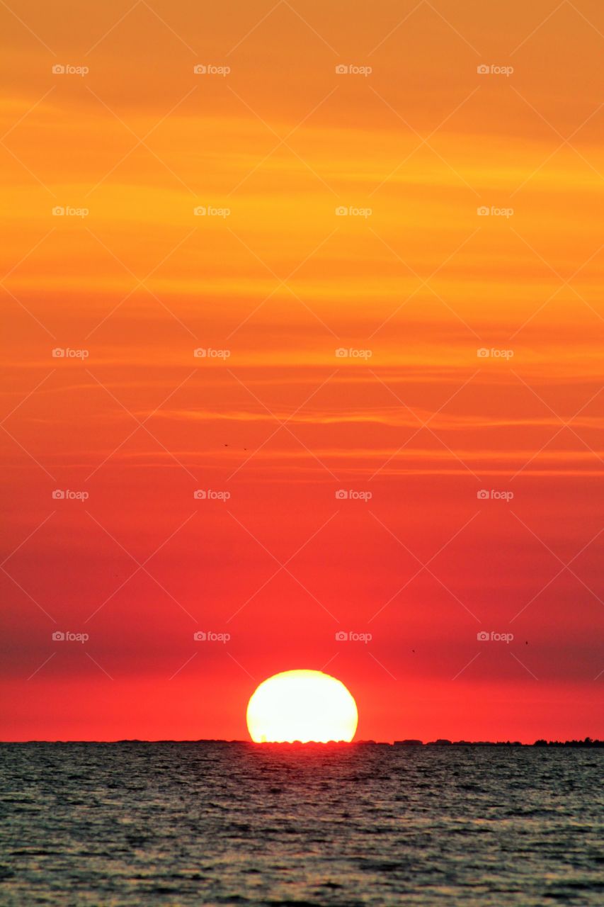 Scenic view of seascape at sunset