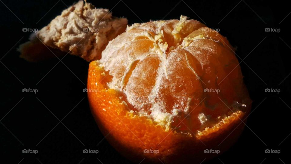 Close-up of orange with peeled