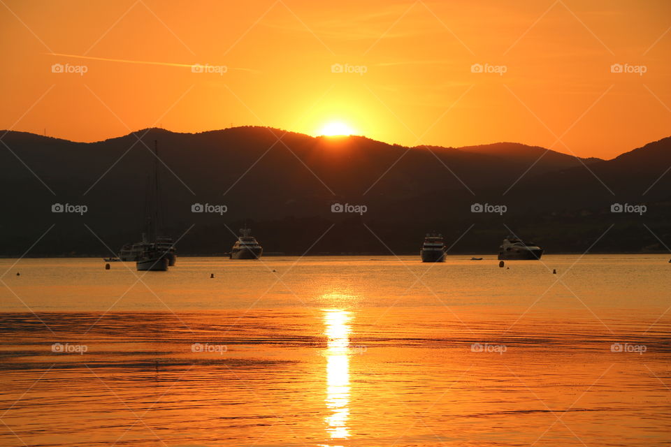 Sunset mirroring into the sea