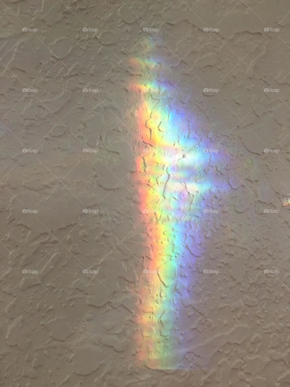 Rainbow on the wall.