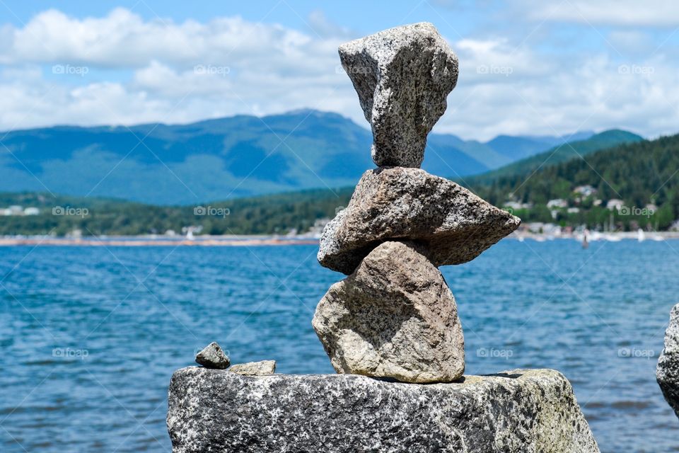 Stacked stones otherwise known as inuksuk or inukshuk; an aboriginal tradition, this stack at a harbour near Vancouver in Port Moody