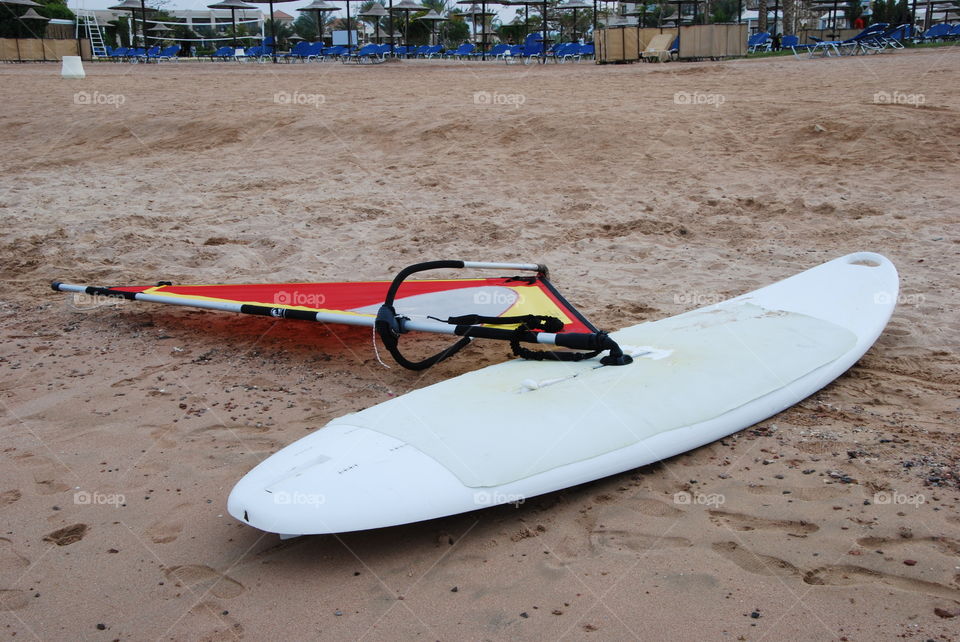Windsurfing equipment on beach