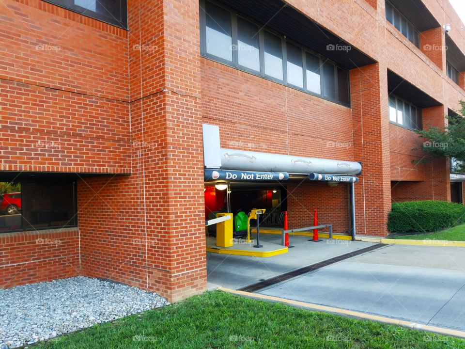 Rich brick tones over concrete and grass