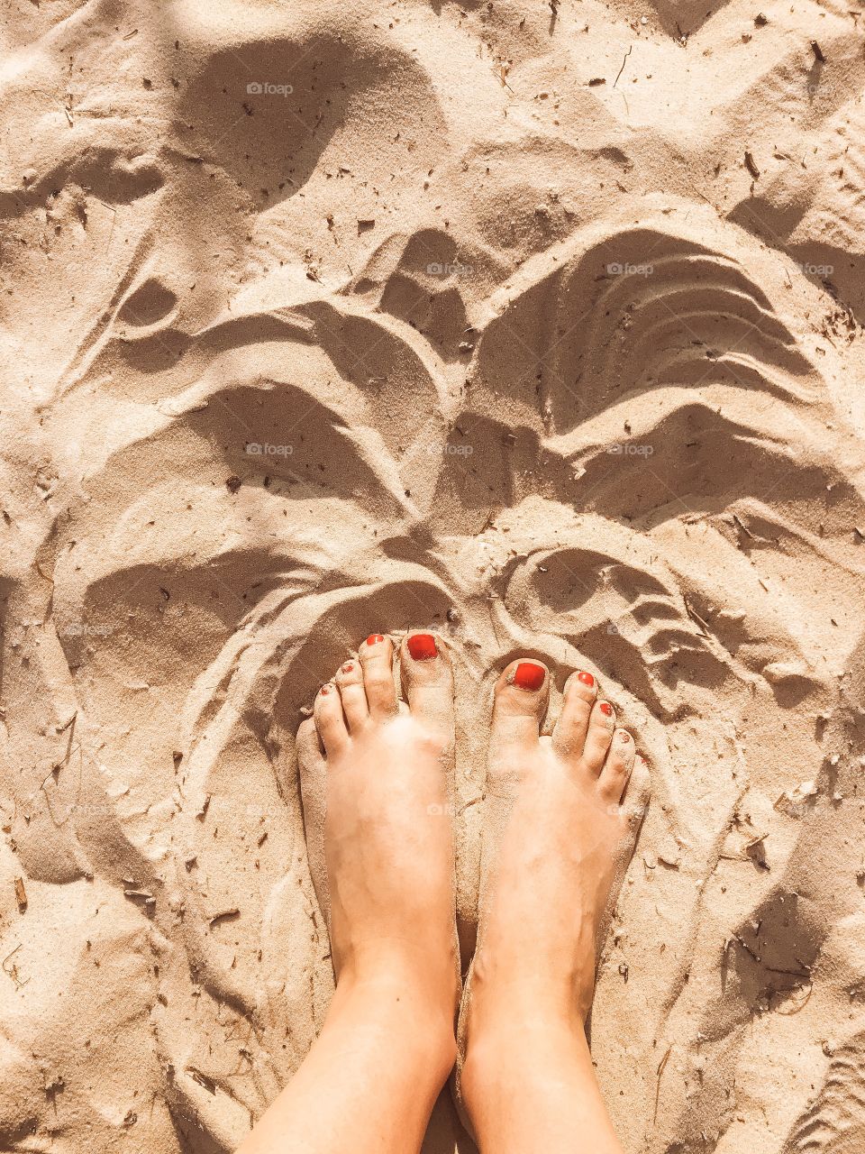 feet on the sand