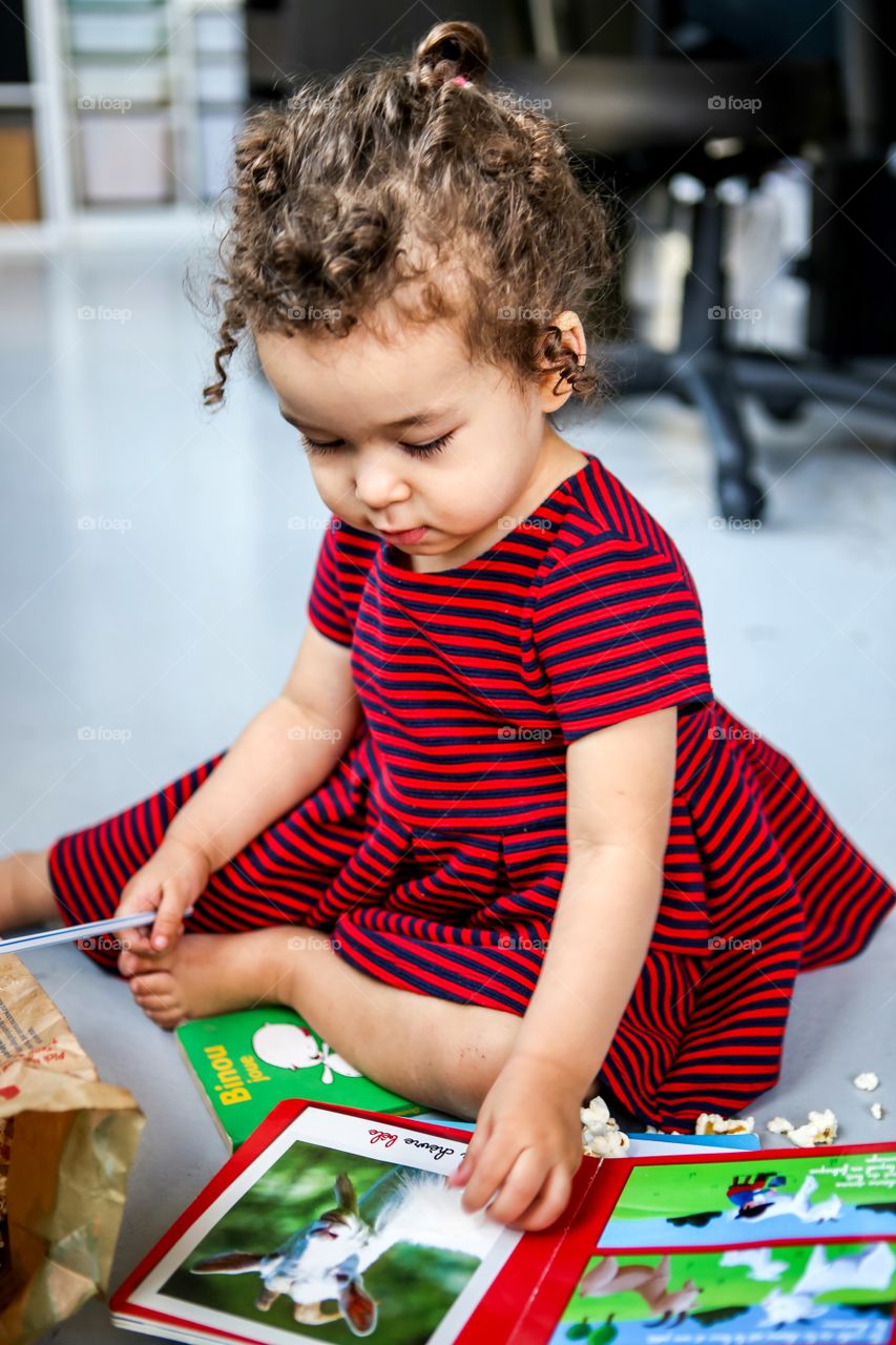 Little girl reading 