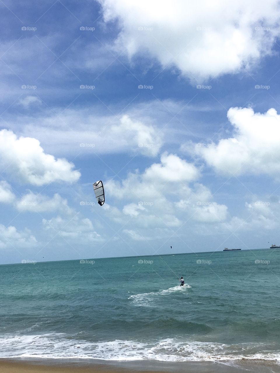 My boyfriend on his third kite surfing downwind!