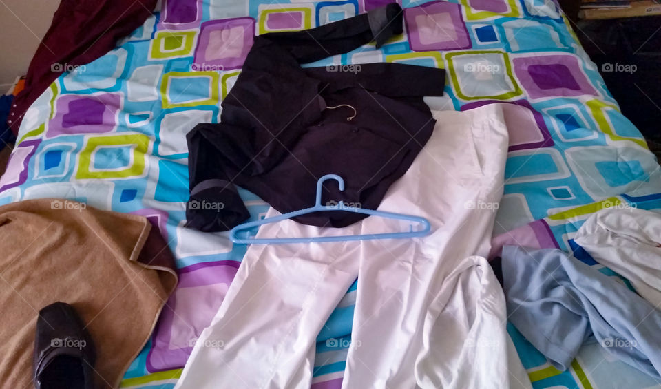 men clothing strewn over,  shirts combinations, pant