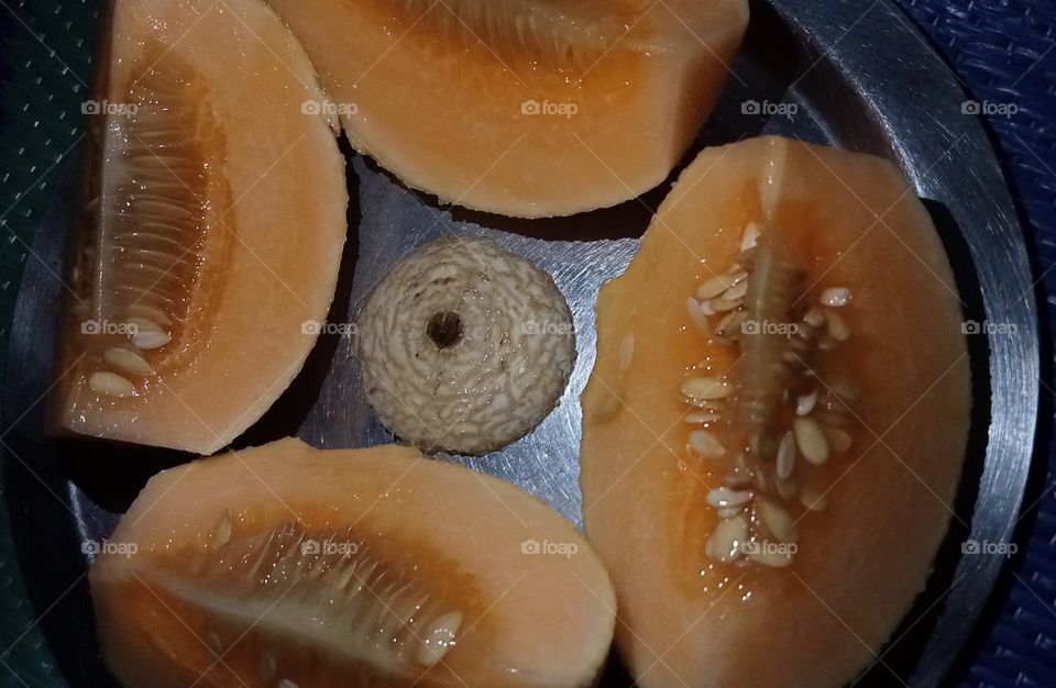 Muskmelon is in melon categories fruit. In this fruit high water containt. Soft and tasty muskmelon is in round shape. Muskmelon like Watermelon 🍉😋 this is summer snacks.