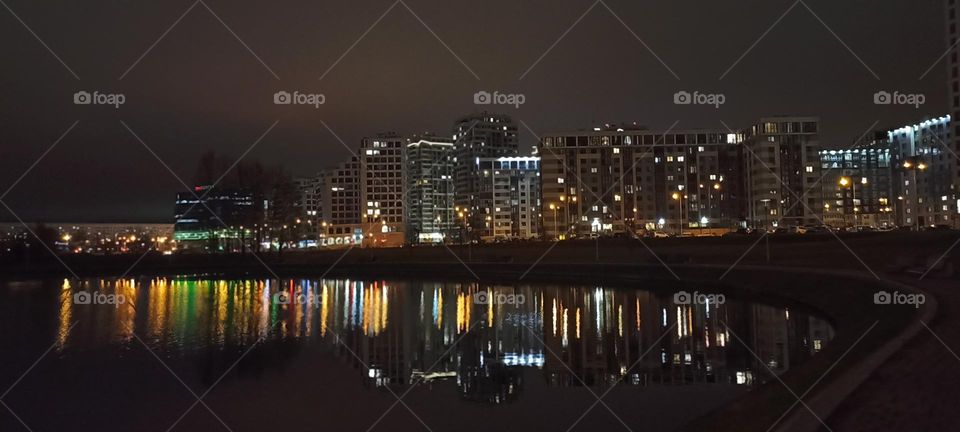 very beautiful night light windows city and reflection