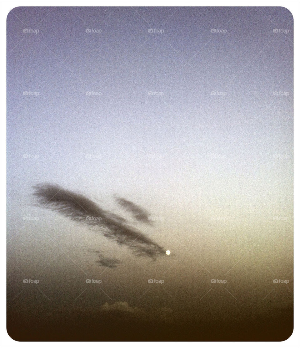 Moon and clouds during sunset in Miami Beach