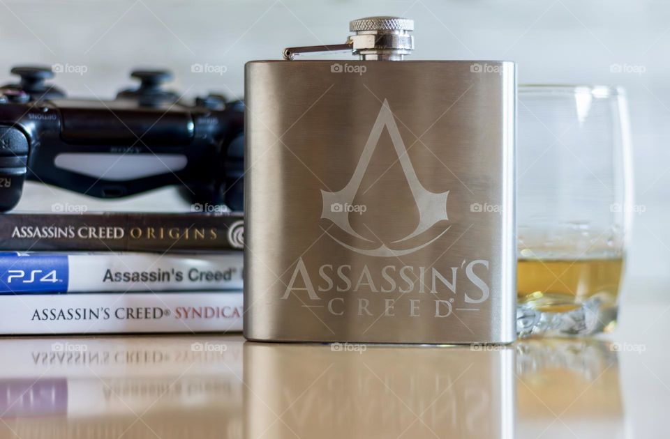 Assassin’s Creed hip flask and whiskey, with AC games & controller 