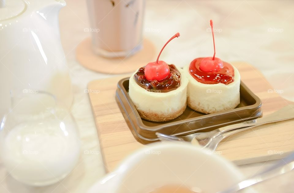 sweet raspberry cake topping with cherry