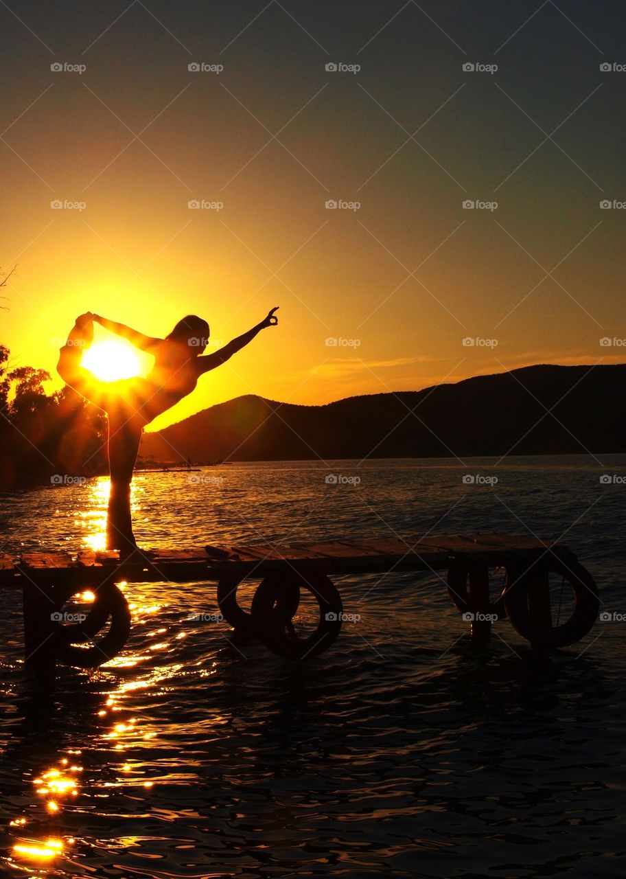 Sunset yoga pose