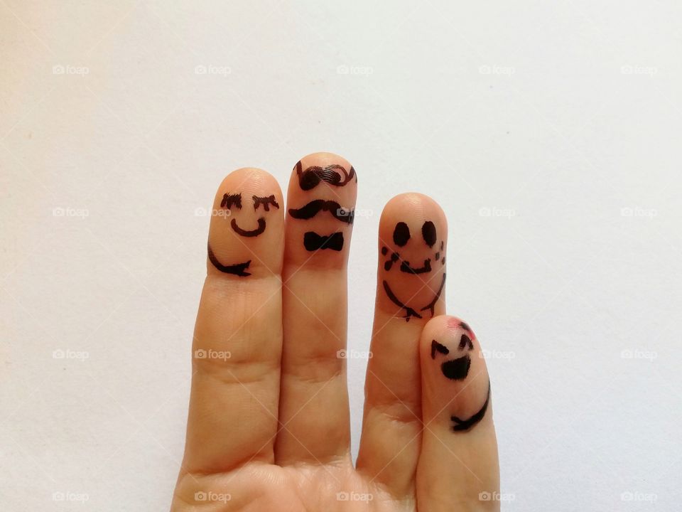 Hand fingers drawn with characters from a family