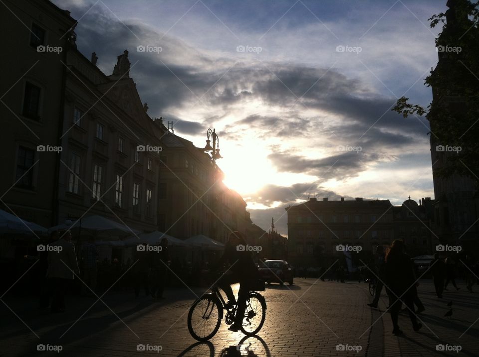 A sunset bike ride through Krakow square