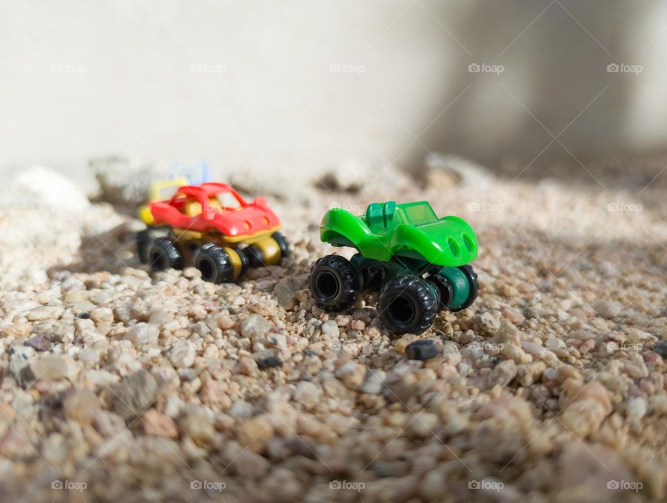 Toy cars low to the ground