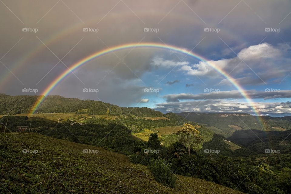 Double rainbow in the hills