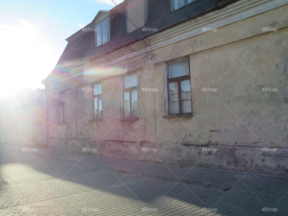 Sun dappled house in the little town of Makov, Poland