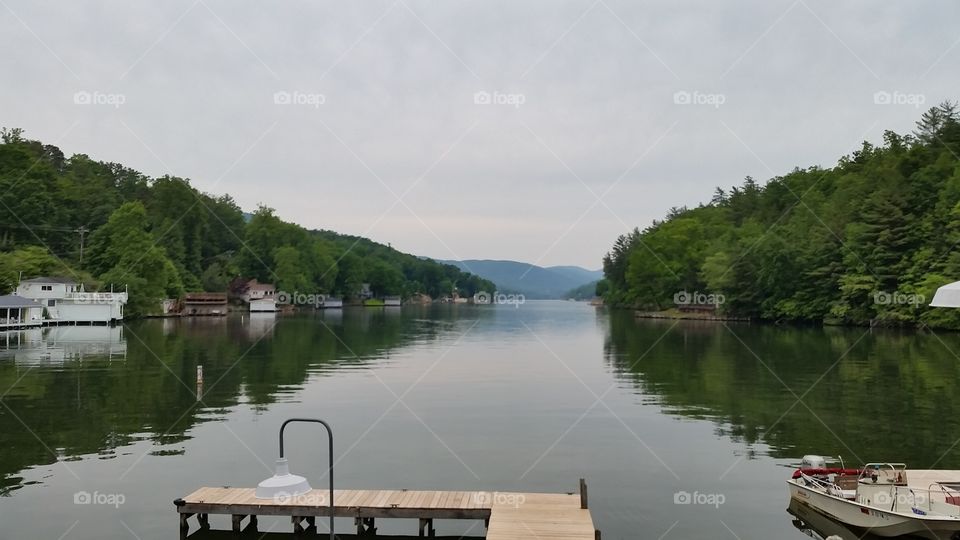 lake view from the dock with mountains in the background