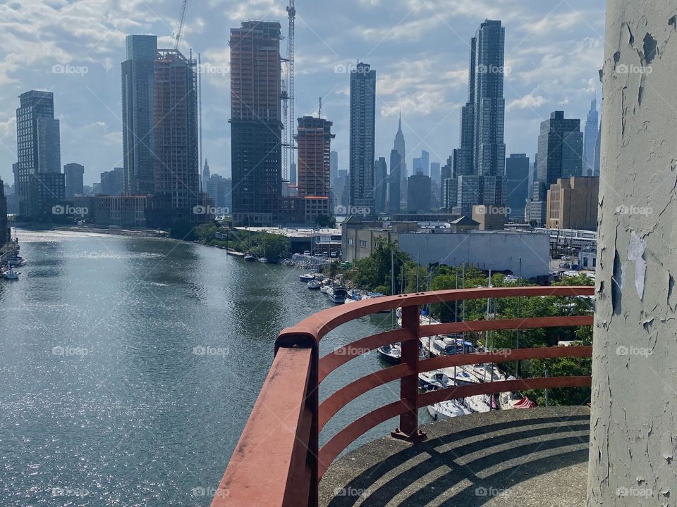 This enclosure at the central viewing outpost on top of the “Pulaski Bridge” by “Newtown Creek” protects all curious onlookers so no harm may come to them. 2023. Hypnotic Productions