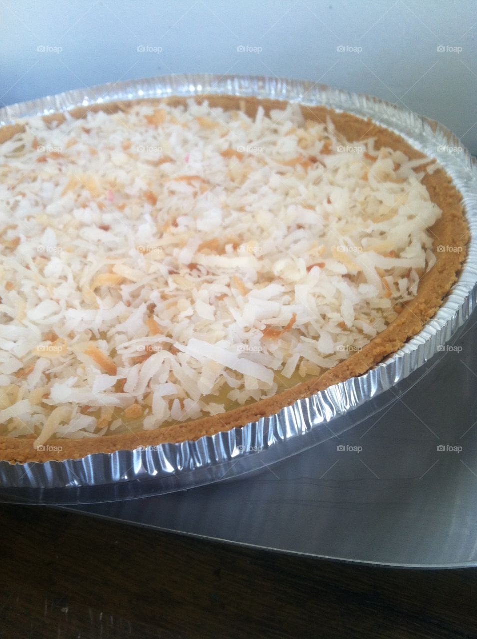 Key lime pie topped with coconut 