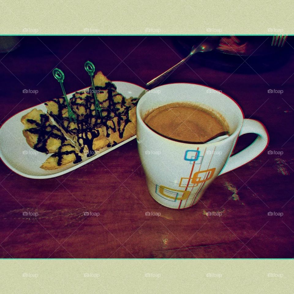 My breakfast is hot coffee and toast with chocolate sauce.