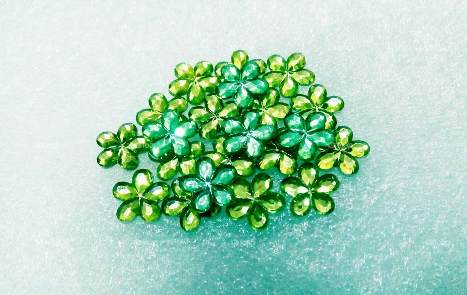 Green flower shaped rhinestones