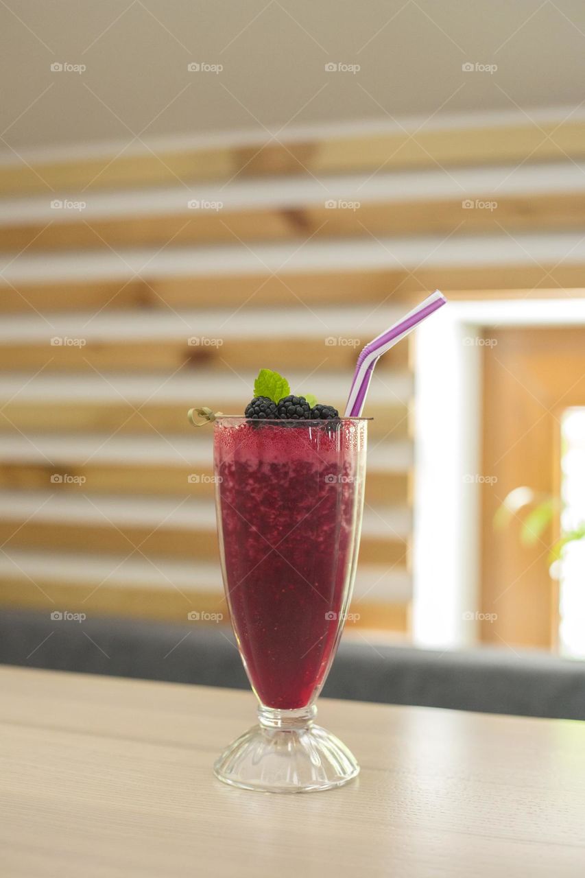 Raspberry smoothie in the glass