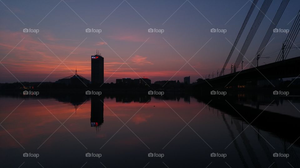 A beautiful sunset over city panorama with river in Riga, Latvia