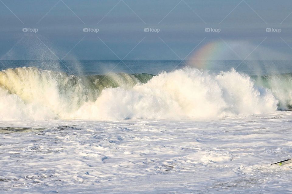 Large wave with a rainbow at The Wedge, Newport Beach, CA