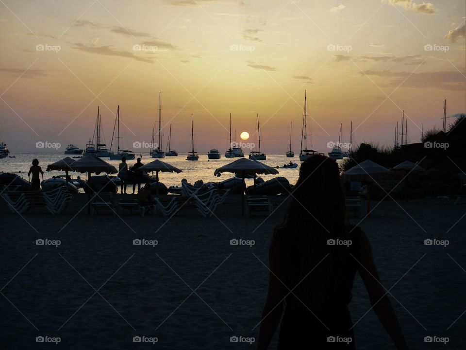composition of silhouettes on a beach