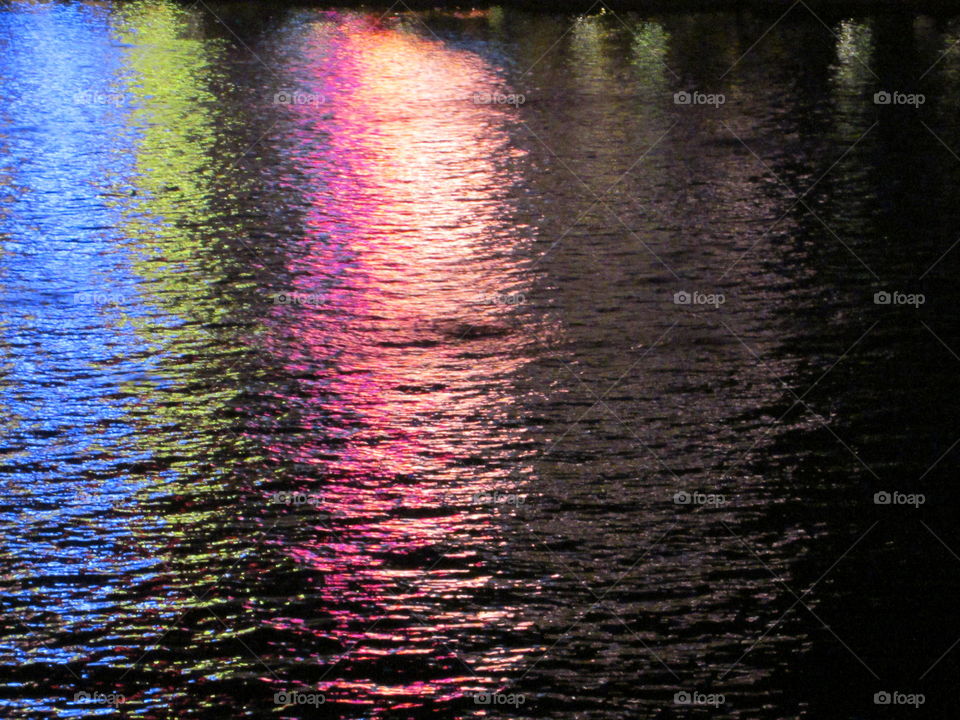 Rainbow Shine Across Water