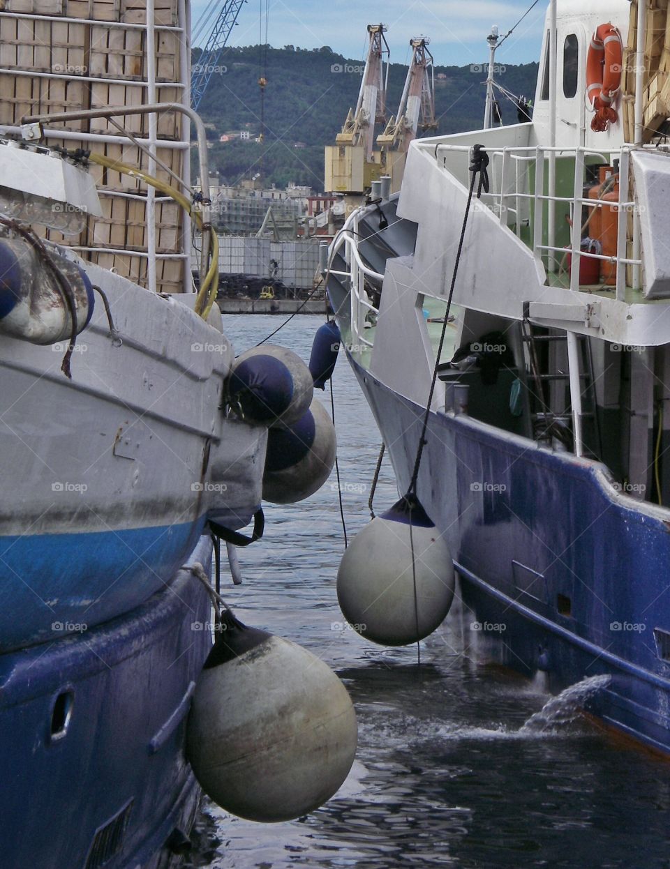 Harbour detail. Boats and cranes in La Spezia, Italy