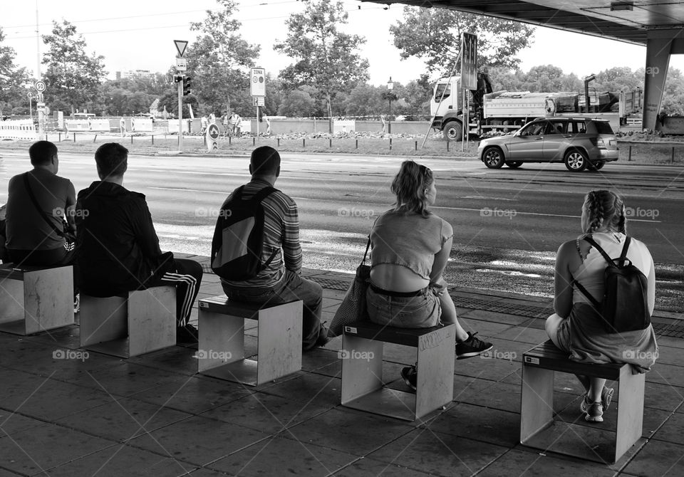 Five ... waiting for the bus 