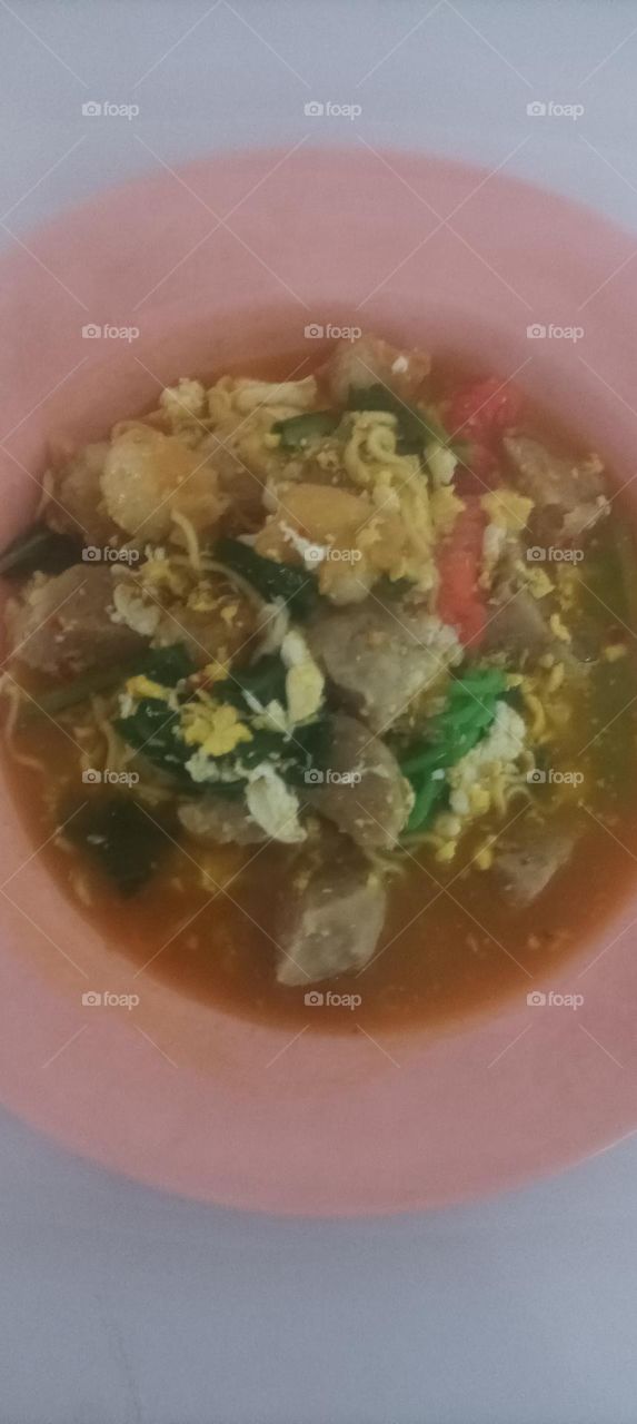 This is a typical Sundanese food in West Java, Indonesia.  the name of the food is seblak