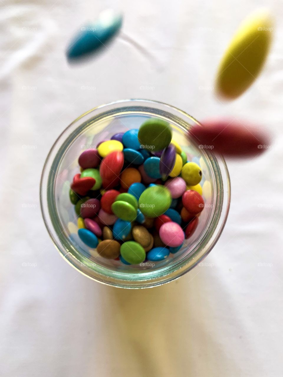 Best of the best. These smarties were captured falling into a cylindrical container