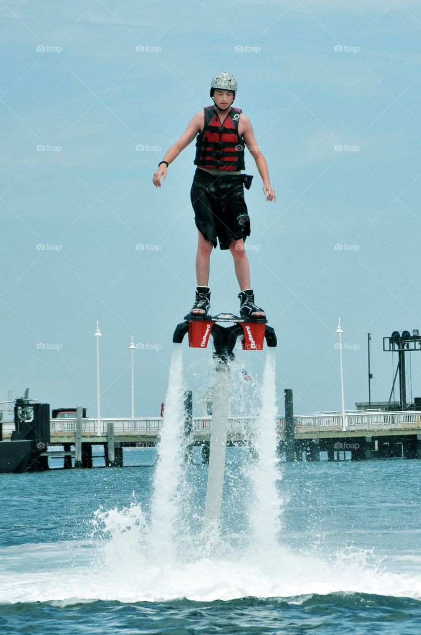 Young man/teen fly boarding