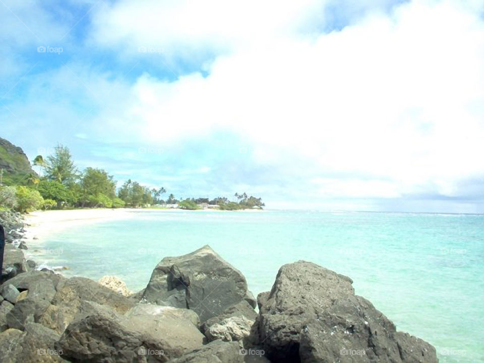 Along the North Shore of Oahu. A view along the beach of the north shore of Oahu Hawaii.