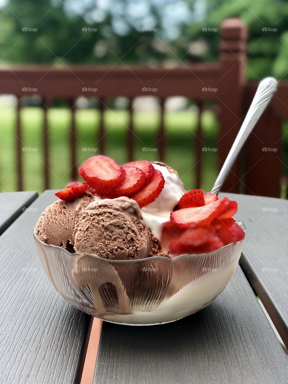 Delicious summertime treat, ice cream bowl, ice cream with toppings 