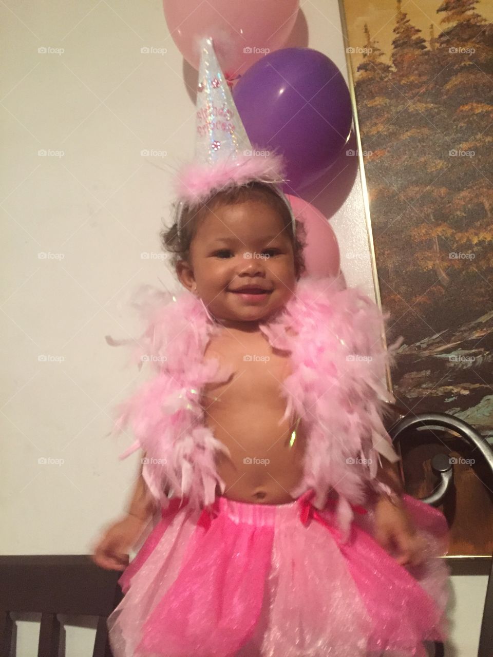 birthday girl at her 10 months party 