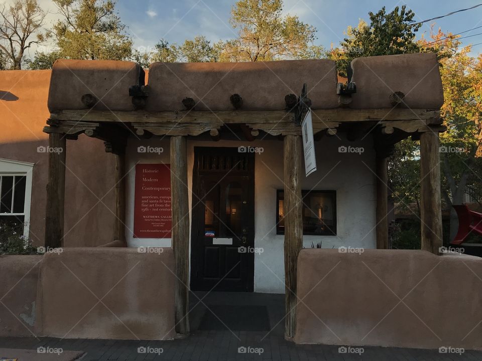 Traditional adobe building and art gallery on Canyon Road in Santa Fe, New Mexico